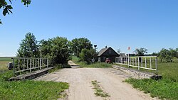 Мост через нижнее течение Неретини на границе Латвии и Литвы летом 2010 года.