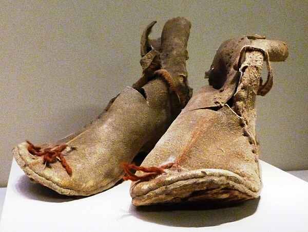 Oxhide boots from Loulan, Xinjiang, China. Former Han dynasty 220 BC – AD 8