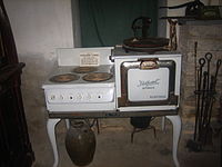 Exhibit of an early stove Primitive stove at Whitehead Memorial Museum Picture 1793.jpg