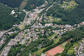 Aerial view of the town center of Schalksmühl.  The hut with the old and the newer local area is located in the upper left corner of the picture on the left of federal road 54