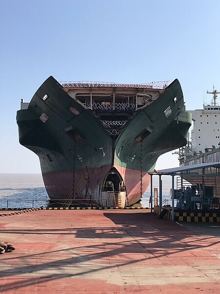 File:Ship beached in recycling facility in India.jpg