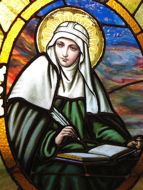 St Bridget of Sweden pictured with a halo. In Christian iconography, saints may also be depicted with wreaths, palm branches, and white lilies.