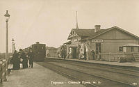 Junan saapuminen asemalle.  Kuva vuoden 1904 jälkeen