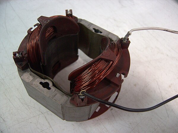 Field coil electromagnet on the stator of an AC universal motor.