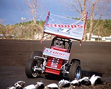 Butler won in both winged-sprint cars and in the non-winged formula preferred by USAC Steve Butler Wing 88.jpg