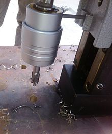 A perfect 14 mm diameter hole made by a TCT annular cutter TCT annular cutter in action.jpg