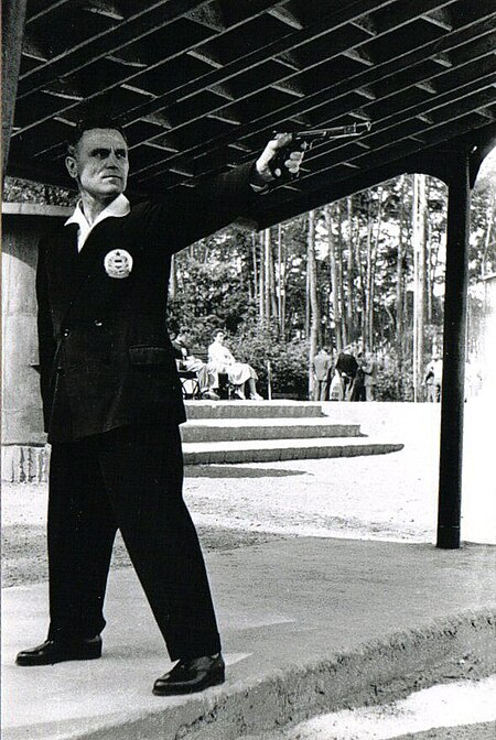 Takács Károly shooting on Poland-Hungary-Yugoslavia match 1961.jpg