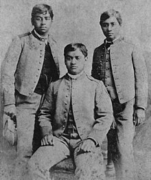 Hawaiian princes David Kawananakoa, Edward Abnel Keli`iahonui and Jonah Kuhio Kalaniana'ole in their cadet uniforms. Three Princes of Hawaii at San Mateo without caps (restored).jpg