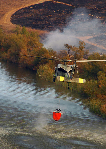 File:US Navy 071023-N-3069F-040 An MH-60S Seahawk assigned to Helicopter Sea Combat Squadron (HSC) 85, lifts a full 420-gallon extinguishing trough from a local reservoir near the raging wildfires in San Diego County.jpg