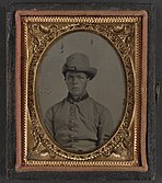 Unidentified soldier in Confederate uniform and Hardee hat LCCN2013645713.jpg