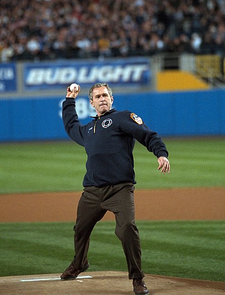 President Bush tosses out the ceremonial first pitch before a 2-1 Yankee victory in Game 3 of the 2001 World Series.
