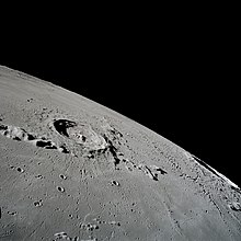 grayscale image of a crater on the moon