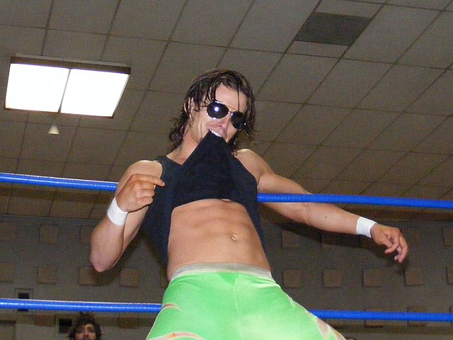 Cole posing on the ring apron in 2010