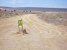 Radiation sign at Ambrosia Lake uranium mining area, New Mexico. Ambrosia Lake radiation sign.jpg