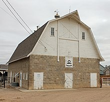 A pointed hay hood on the gambrel roofed Anderson Barn in Johnstown, Colorado Anderson Barn.JPG