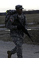 Army Staff Sgt. Martin Lyke, from 206th Regional Support Group, competes in a ruck march, carrying his M4 carbine assault rifle, during the 2012 Best Warrior Competition at Camp Dodge in Johnston, Iowa, Nov. 13 121113-A-MD123-004.jpg