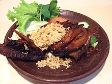 Ayam goreng Kalasan with kremes, seasoned fried chicken with crispy fried flour granules. Ayam goreng kalasan.JPG