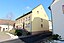 54634 Bitburg-Masholder, Im Wingert 11. Am nordöstlichen Rand des Ortskerns erhebt sich ein ortsbildprägender Winkelhof, dessen parallel zum Hang steh...