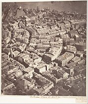 1860年、金融地区の航空写真。中央左に集会場が見える。