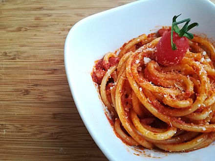 Bucatini with Amatriciana sauce, which features the New World food of tomatoes