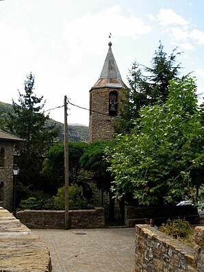 Calvera with bell tower of the parish church of San Andrés