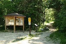 Hikers can access the 2,200-acre Cedarburg Bog via a network of trails and boardwalks. Ced-Bog Kiosk June2013.jpg