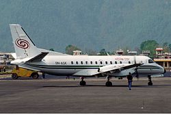 Saab 340 авиакомпании Cosmic Air в аэропорту Покхара, апрель 2001 года