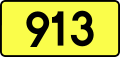 English: Sign of DW 913 with oficial font Drogowskaz and adequate dimensions.