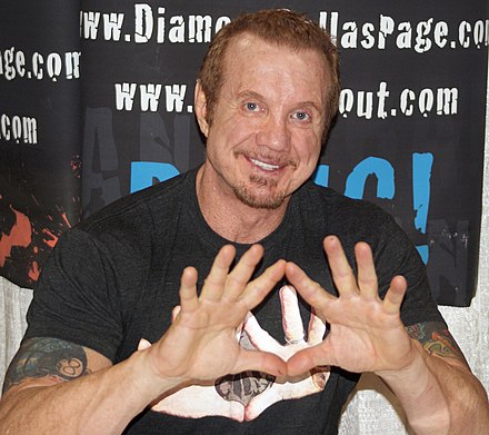 Page demonstrating his "Diamond Cutter" hand symbol in 2011