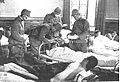 Chinese soldiers injured during the Battle of Nanking receiving treatment from Japanese army medics at a field hospital set up inside the building of the Chinese Foreign Ministry(Date: December 20 1937)
