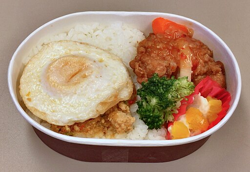 Gapao rice and fried chicken with sweet chili sauce lunch box of NewDays