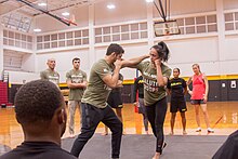 Gil and Keri Melendez teach soldiers martial arts techniques at Schofield Barracks, Hawaii, in 2019 Gil and Keri Melendez teach soldiers martial arts techniques.jpg