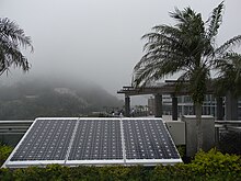 Photovoltaic panels at The Peak Galleria HK Peak Galleria Shan Ding Guang Chang roof Sunday fog Solar cell panel.JPG