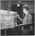 Painter Hale Woodruff at work on a canvas, c. 1936.