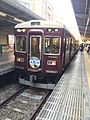 Hankyu 5000 series Imazu Line (north) train with Osaka Hai headboard 2017-03-28.jpg