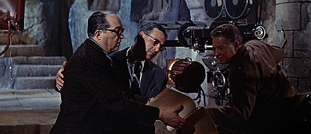 Koster (left) with producer Samuel G. Engel and cameraman Arthur Arling on the set of The Story of Ruth (1960).