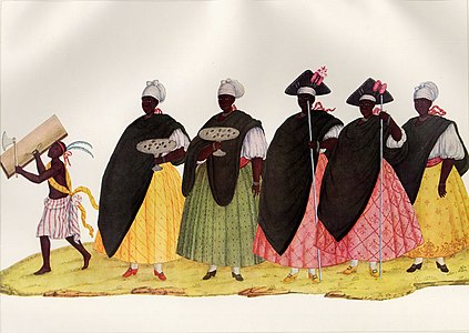 Mulheres negras com roupas de festa.