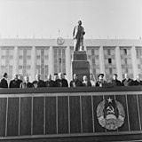The statue behind a podium during a ceremony in 1976 in Chisinau (then Kishinev) Lenin, Brezhnev, Bodiul etc. (1976). (14241235186).jpg