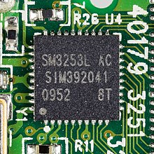 SM3253L flash memory controller on a USB flash drive Lexar USB stick 8 GB - Silicon Motion SM3253L-0309.jpg