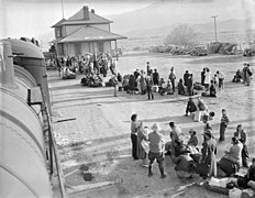 Lone Oine, California. Evacuees of Japanese ancestry waiting to board buses which will take them to . . . - NARA - 536011.jpg