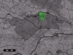 The town centre (dark green) and the statistical district (light green) of Eck en Wiel in the municipality of Buren.