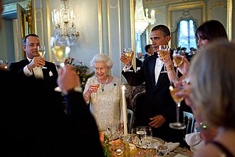 Hanks with Queen Elizabeth II and U.S. President Barack Obama at Winfield House in London P052511PS-1339 (5836460582).jpg
