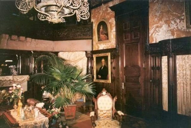 A room in the Paine Mansion—which is now a fraternity house belonging to the Alpha Tau chapter of Pi Kappa Phi at Rensselaer Polytechnic Institute—sta
