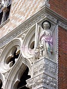 Gothic corner, Doge's Palace, Venice, Raphael's scroll reads "Efficia fretum quietum" (“Keep the Gulf quiet”).