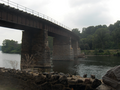 Philadelphia & Reading Railroad, Bridge at West Falls, built 1890, is a stone and iron plate bridge that spans the Schuylkill River at Falls of Schuylkill, in Fairmount Park in Philadelphia, Pennsylvania. Looking from Kelly Drive, downstream.