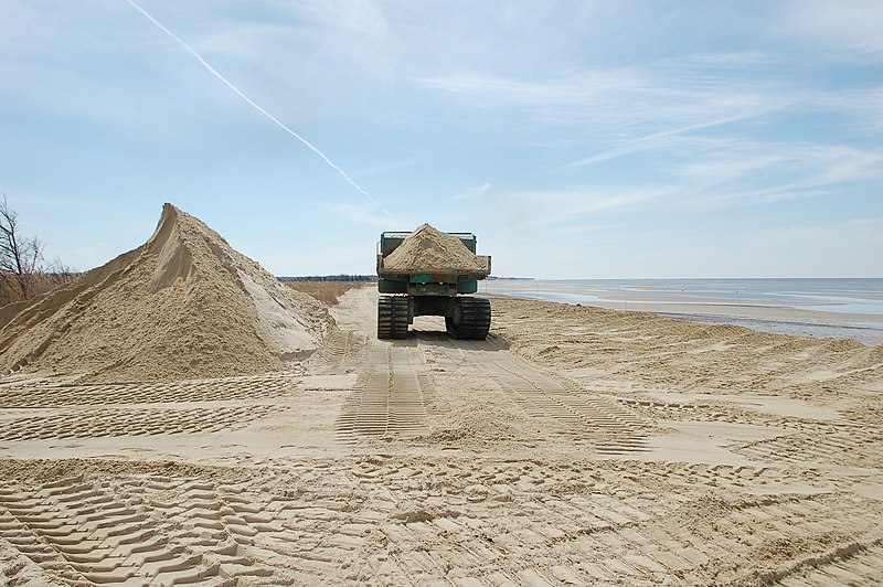 File:Rubber-tracked dump truck hauls sand at Kimbles Beach. (13468652904).jpg