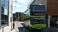 English: Southern Vectis 1113 Yellow Ledge (HW58 ATF), a Scania OmniCity, about to pull out of Newport, Isle of Wight, bus station, onto South Street. It is on route 9, but as can be seen on the destination display, it has been curtailed to Ryde Town only. Occasionally, when buses are disrupted, route 9s are turned at the top of Ryde, and head back to Newport straight away, which is what is going to happen to this bus. Another bus on route 9, with the standard "Ryde Esplanade" destination, can be seen in the background.