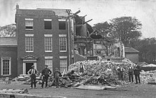 Demolition of part of the hall in 1923 after the removal of the interiors Standish Hall Demolition 1923.jpg