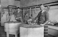 Butcher shop in Wondai, 1935 StateLibQld 2 179199 Claude Burton in his butcher shop in Wondai, Queensland, 1935.jpg