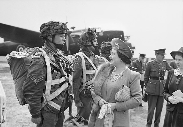Queen Elizabeth and Princess Elizabeth talking to paratroopers in preparation of D-Day, 19 May 1944